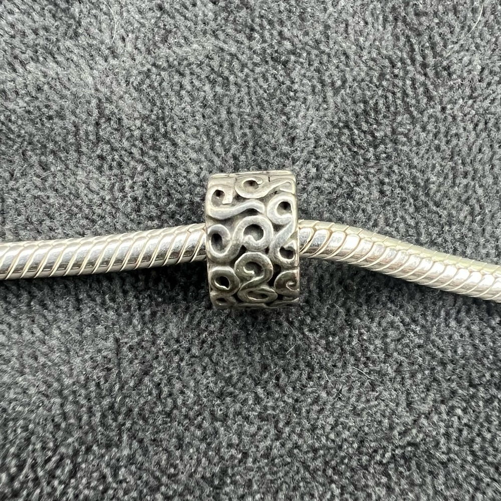 RETIRED Pandora Snap Clast Swirl Charm
